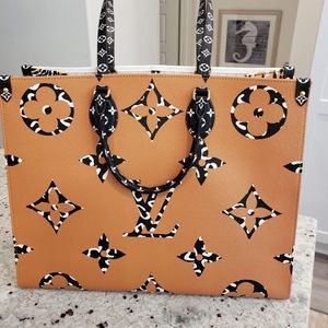 Louis Vuitton On The Go GM Jungle Print